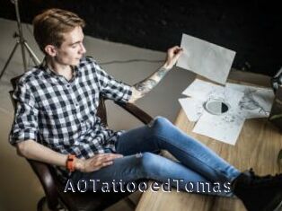 A0TattooedTomas